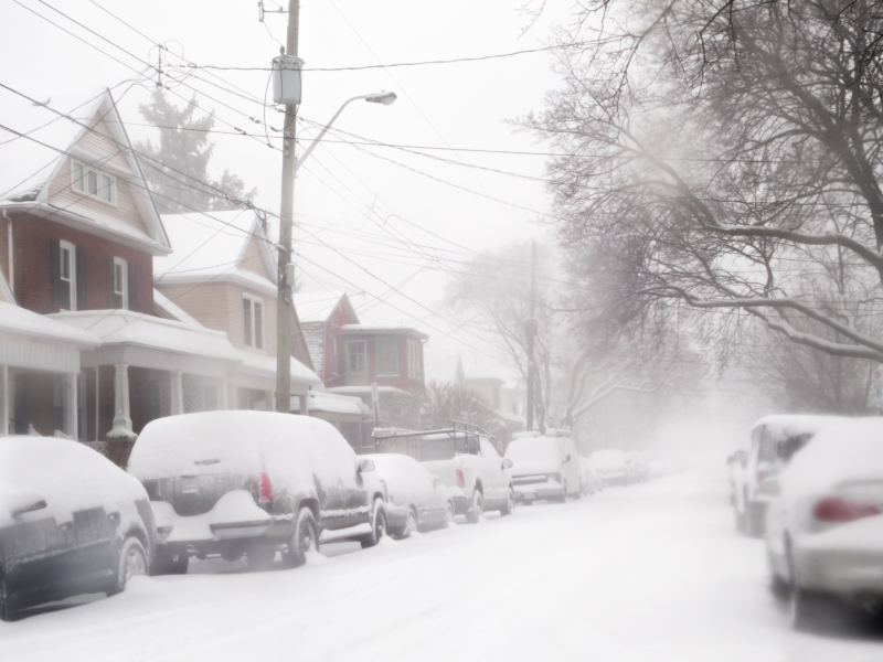 residential street covered with snow